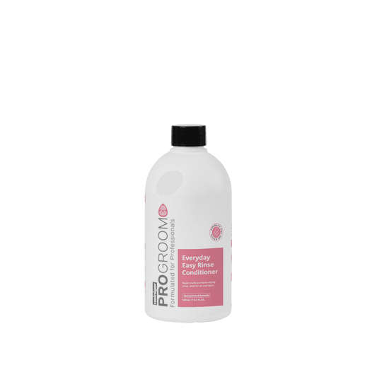 ProGroom Easy Rinse Conditioner bottle with black cap, white with pink label