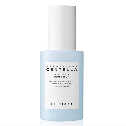 Light blue serum bottle with white pump cap, SKIN1004 label.
