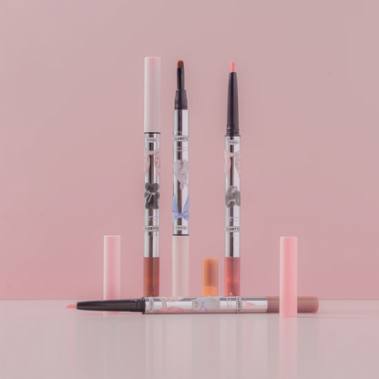 Two double-ended eyeshadow pencils with light and dark color tips