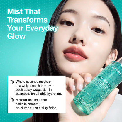 Anua mist bottle with silver pump and teal aqua liquid, held by person