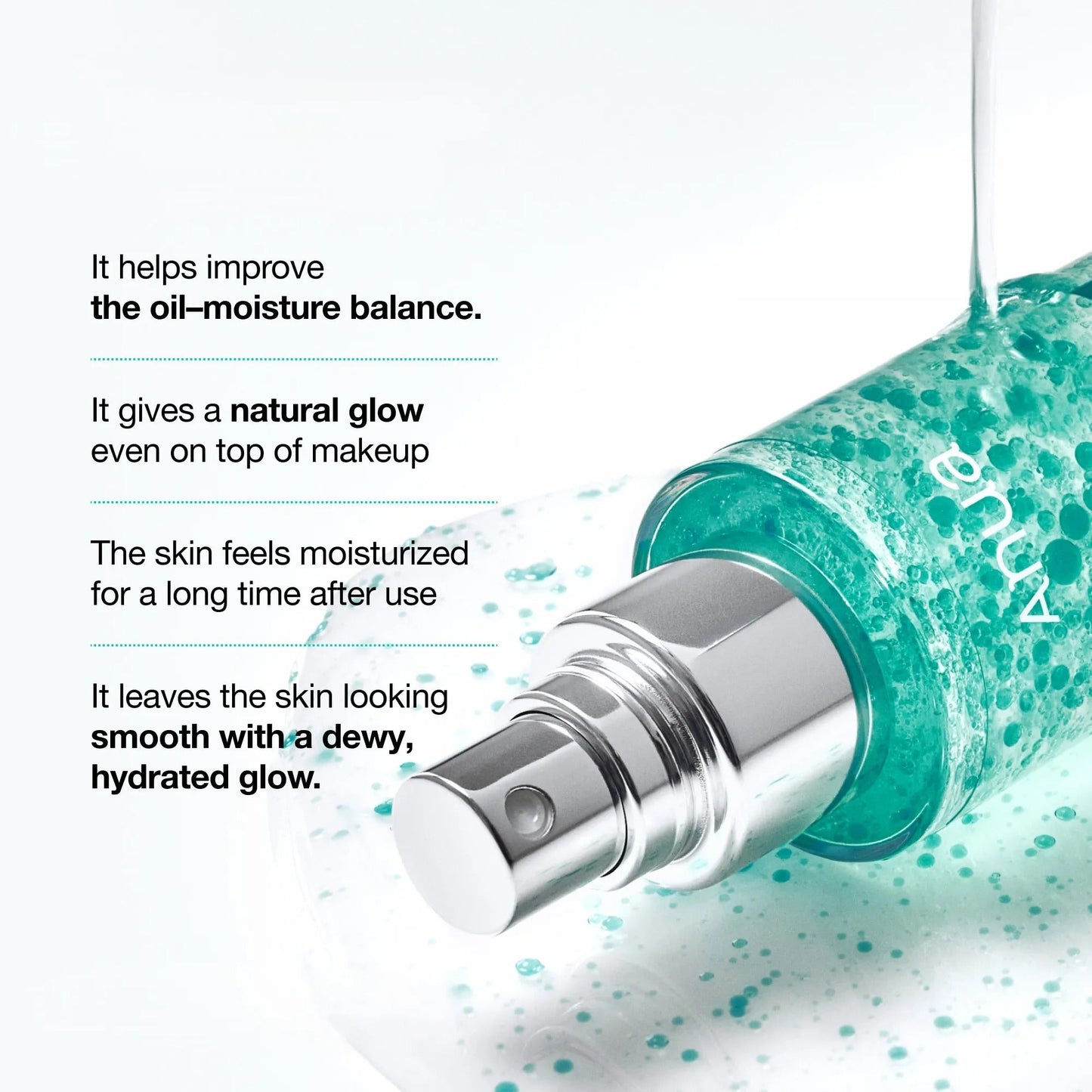 Anua mist bottle nozzle spraying teal mist droplets, silver pump and cap