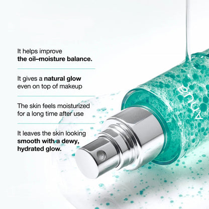 Anua mist bottle nozzle spraying teal mist droplets, silver pump and cap