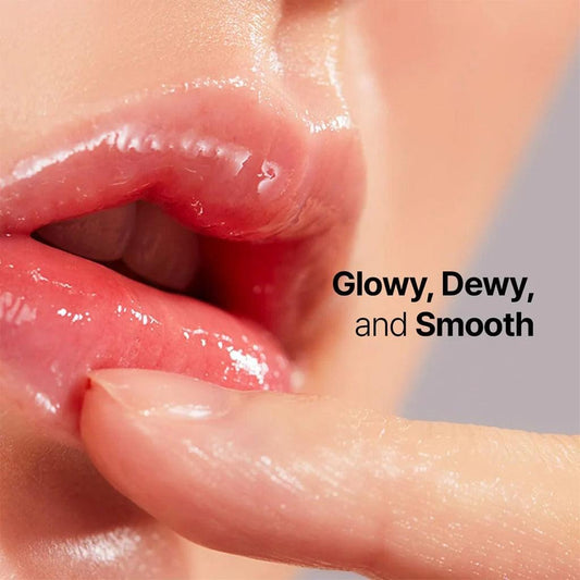 Shiny dewy lip essence on lips, smooth hydrated finish