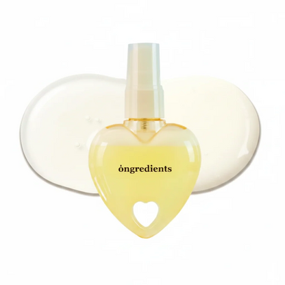 Heart-shaped Skin Barrier Glow Mist spray bottle with white cap and ongredients label