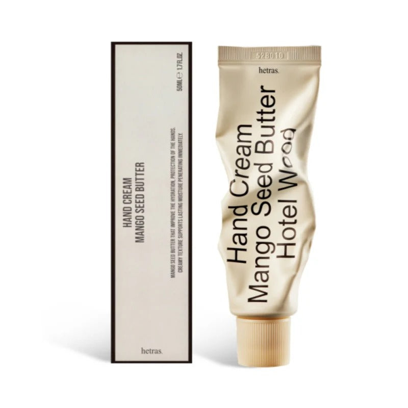Hetras hand cream tube with box, gold tube labeled Hand Cream Mango Seed Butter