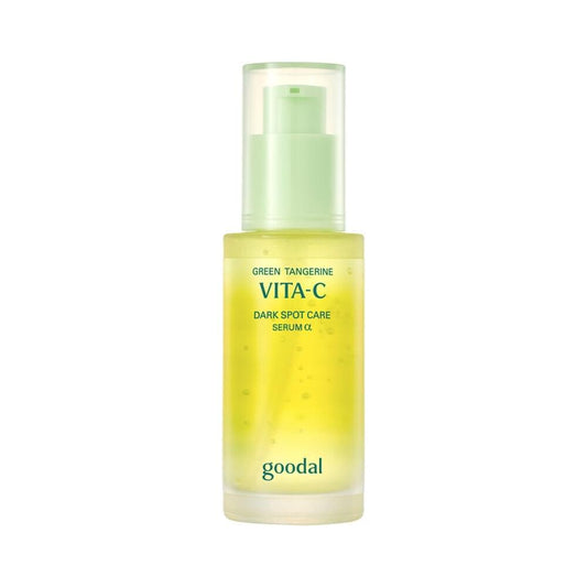 Green citrus VITA-C dark spot care serum bottle with pump, clear yellow liquid