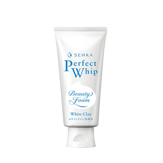White clay facial cleanser tube with flip-top cap, Senka Perfect Whip branding.