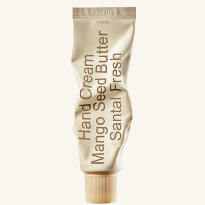 Gold mango seed hand cream tube with vertical label, Hand Cream and Santal Fresh