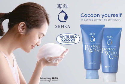 Senka skincare tubes with a woman washing her face, blue-and-white packaging