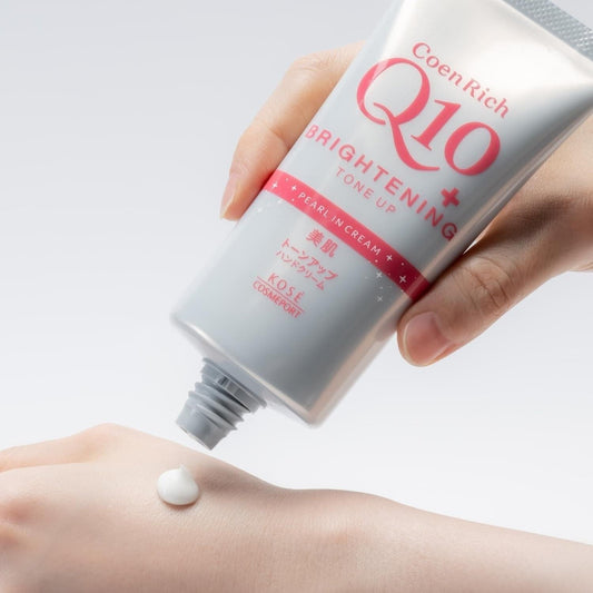 CoenRich Q10 tone-up hand cream tube; small cream dot on hand