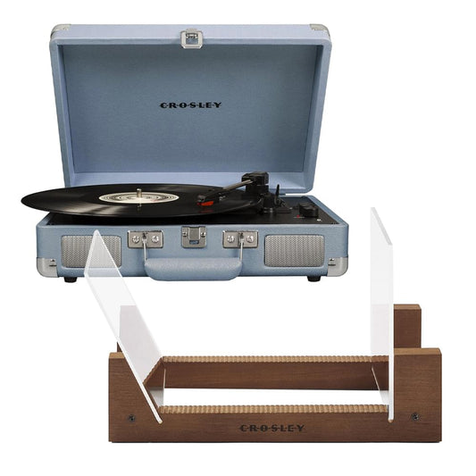 Light blue portable turntable on wooden display stand with open lid and speakers