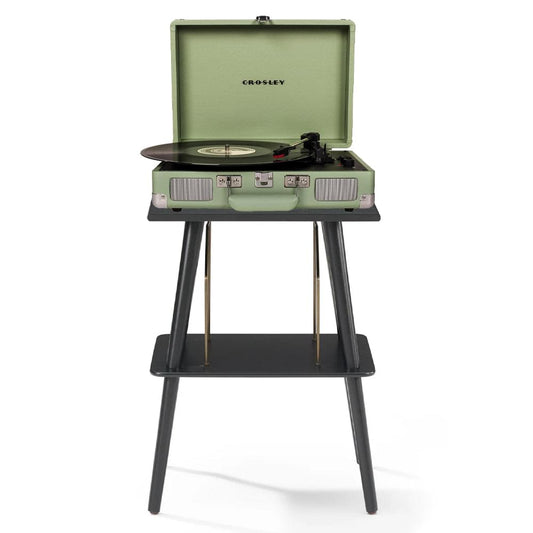 Mint portable turntable with open lid and built-in speakers on a dark stand