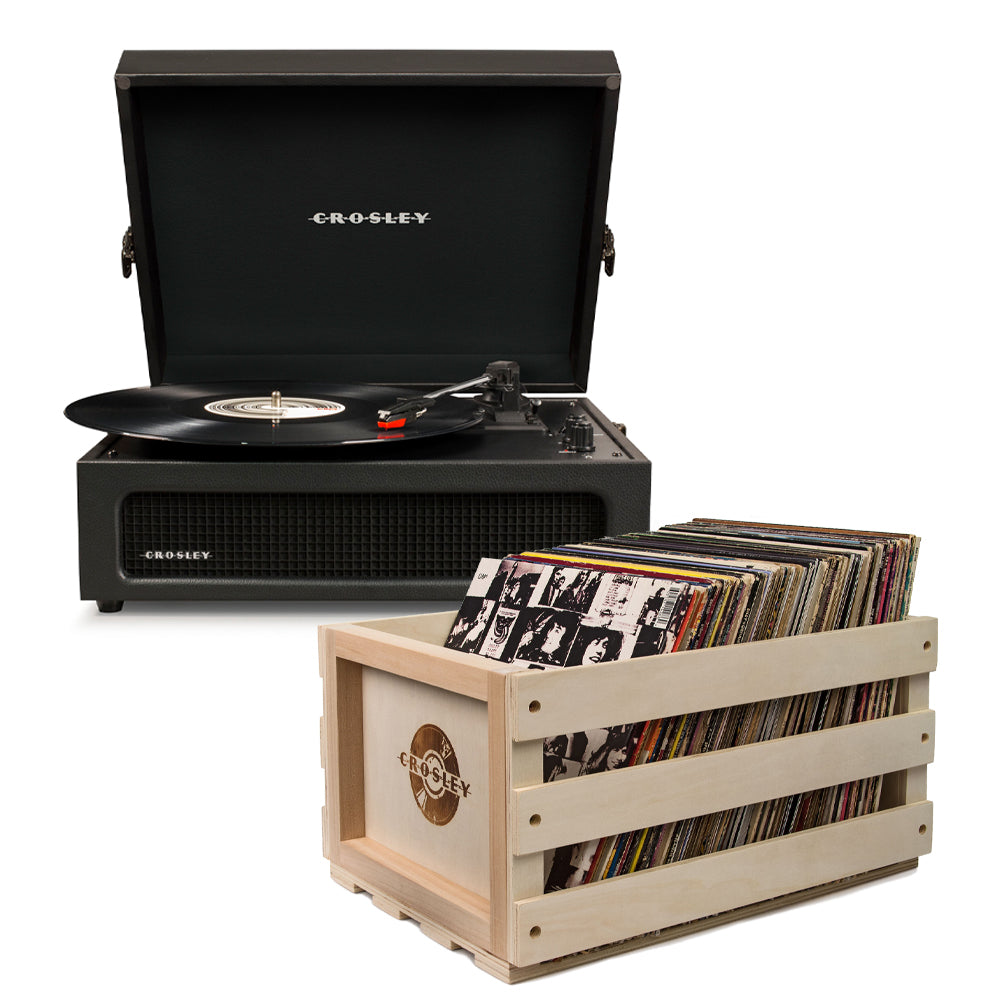 Crosley Voyager black portable turntable open with speaker grille and record storage crate