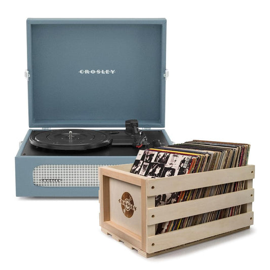Blue portable turntable with open lid and vinyl record storage crate