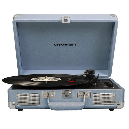 Light blue portable turntable suitcase open with vinyl record on platter and tonearm