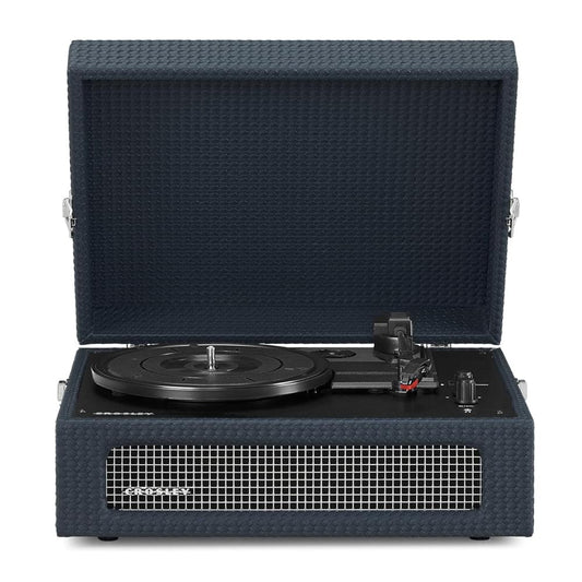 Navy portable Bluetooth turntable with lid open, front speaker grille and tonearm