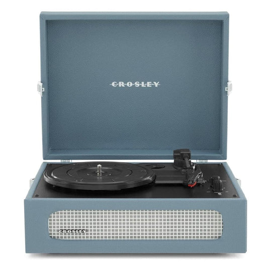 Washed blue portable turntable with open lid, record on platter, tonearm