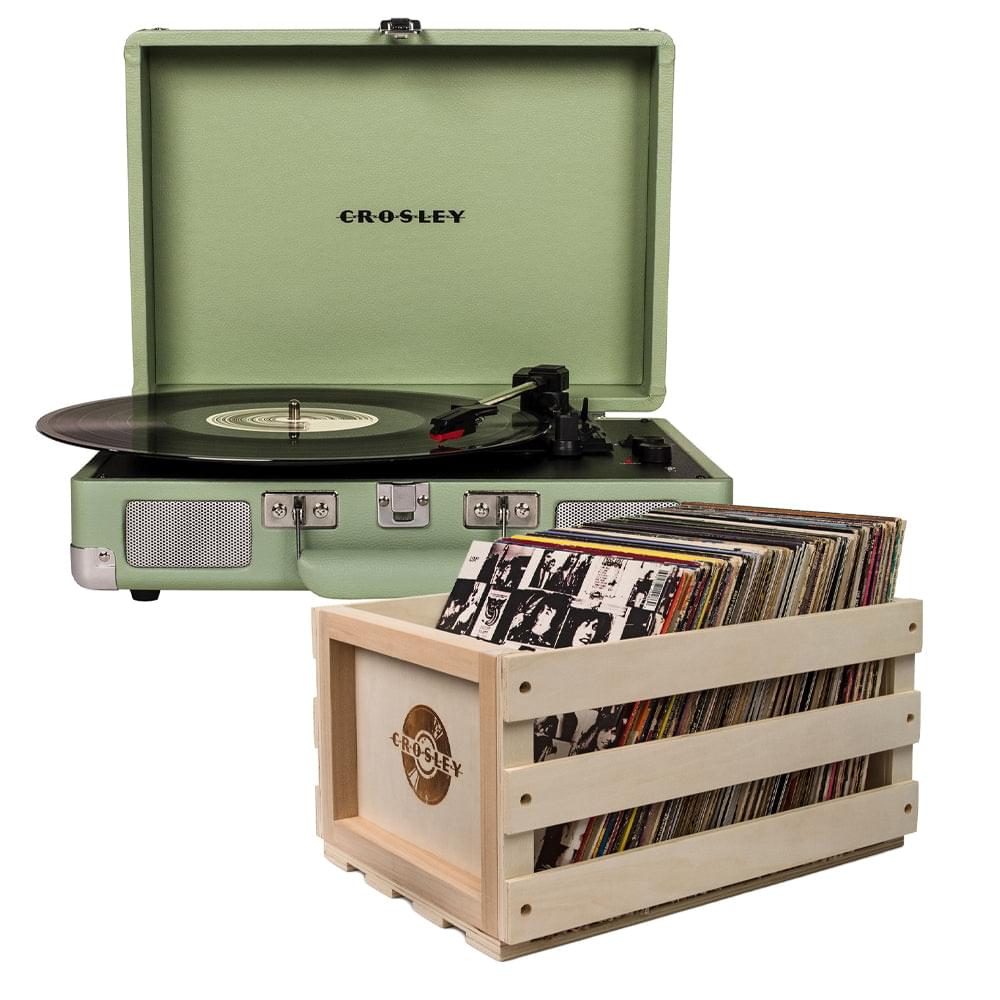 Mint Crosley suitcase turntable with open lid and vinyl records in storage crate.