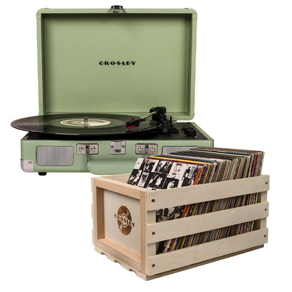 Mint Crosley suitcase turntable with open lid and vinyl records in storage crate.