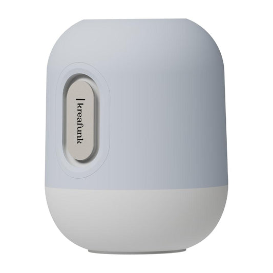 Cloudy blue kids Bluetooth speaker with light, rounded body and Kreafunk side control