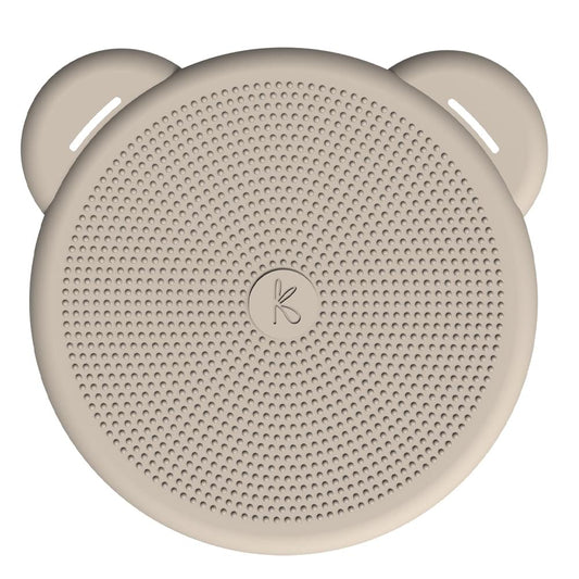 Ivory wireless Qi charger with perforated circular face, ear handles, and K logo