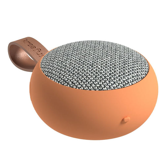 Dusty orange Bluetooth speaker showing gray fabric top and brown strap