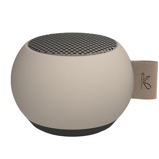 Ivory mini Bluetooth speaker with circular top grille and side carry strap