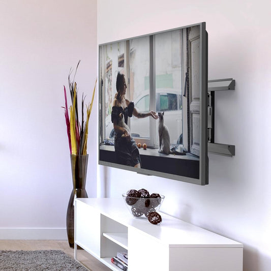 Full motion TV wall mount on wall with TV bracket arms in dark finish