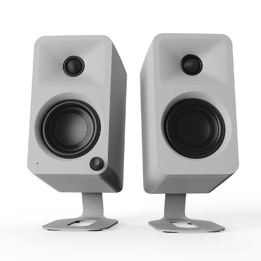 Pair of light gray desktop stands with front speaker-like driver openings