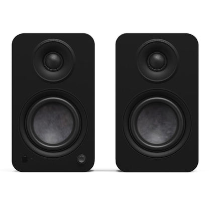 Matte black powered bookshelf speakers with dual drivers and front knobs