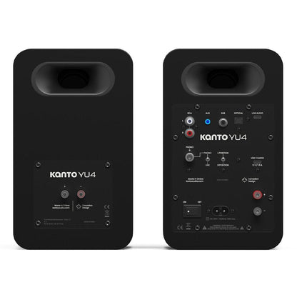 Two matte black Kanto YU4 powered bookshelf speakers with rear connection panels