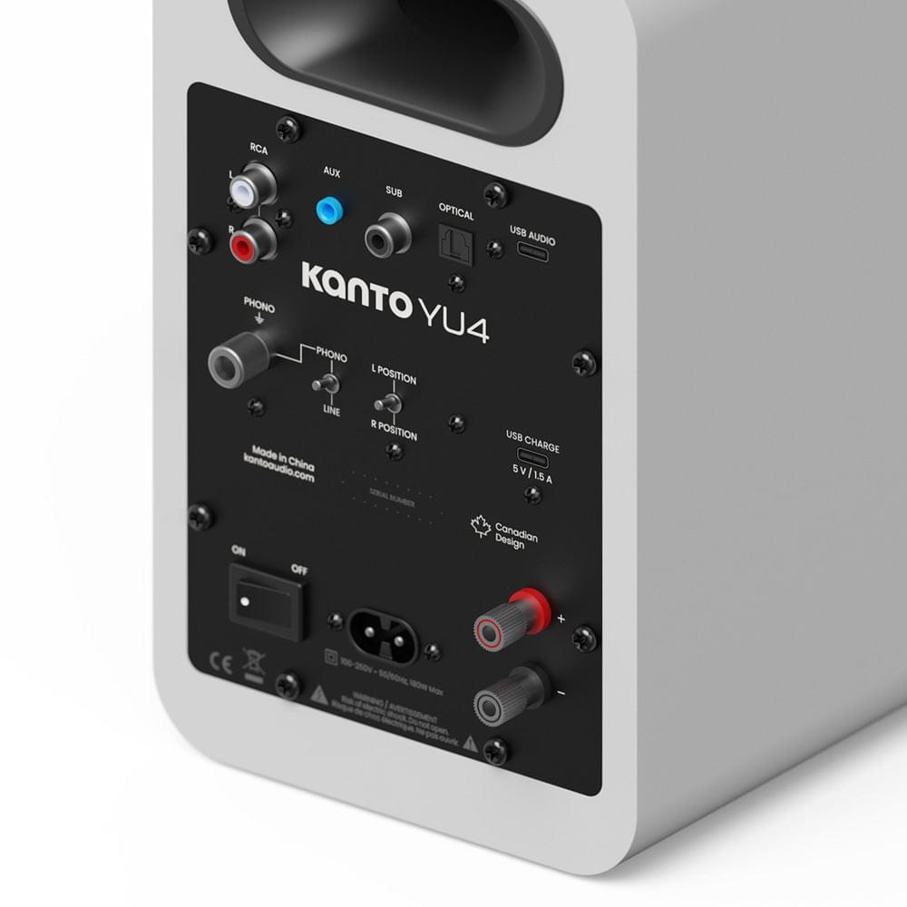 Matte white speaker rear input panel with RCA, optical, and USB-C connections.