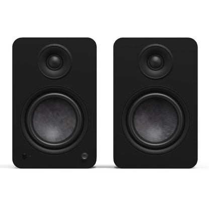 Matte black powered bookshelf speaker pair with tweeters and woofers, front view