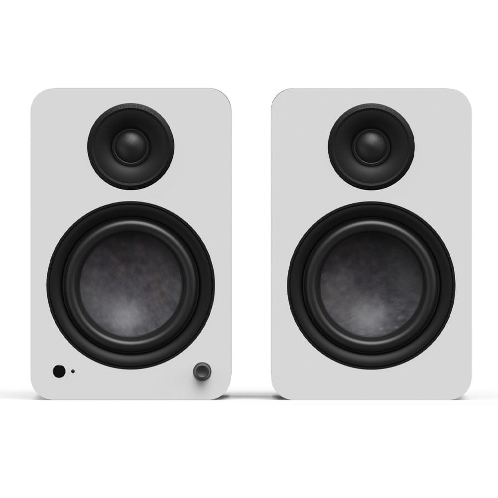 Matte white powered bookshelf speakers, black tweeters and woofers, front view pair