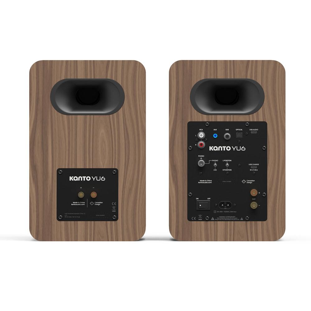 Matte walnut powered bookshelf speakers with rear control panel and black bass port