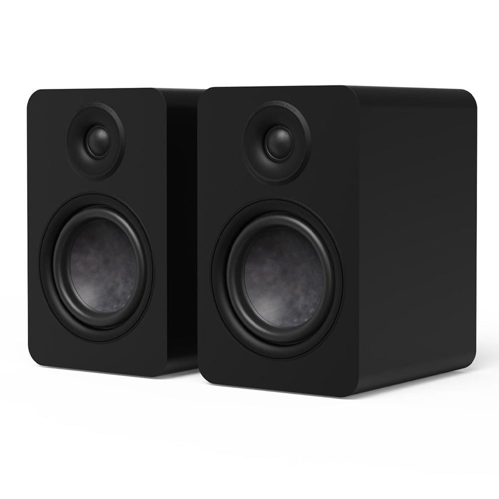Matte black Kanto YU6 passive bookshelf speakers, angled pair showing front drivers