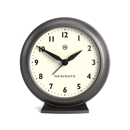 Graphite round mantel clock with cream dial, black hands, and Newgate logo