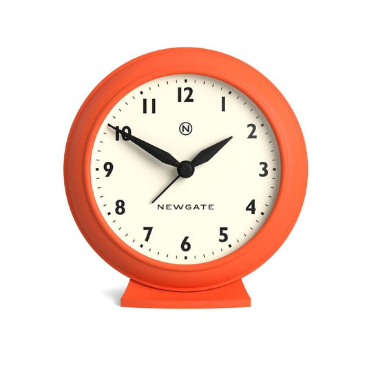 Pumpkin orange mantel clock with cream dial and black hour and minute hands