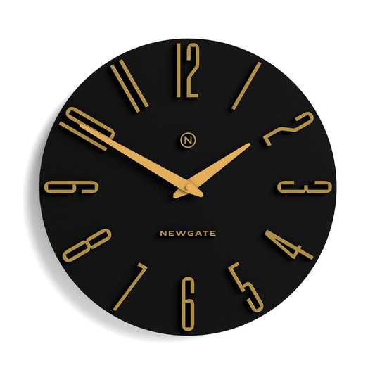 Black Newgate wall clock with gold hands and hour markers, round dial