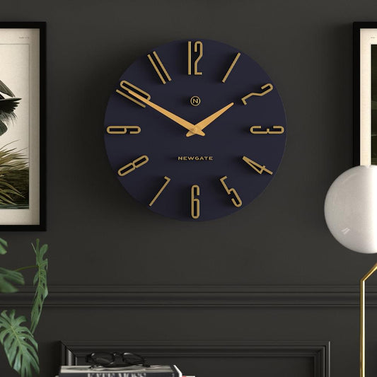 Mounted petrol blue wall clock with gold hour markers and hands, Newgate
