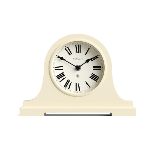 Vanilla cream mantel clock with Roman numeral dial and black hands, front view