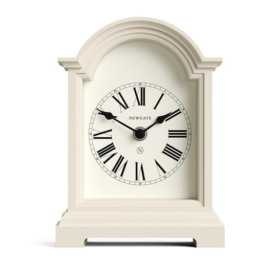 Vanilla cream mantel clock with arched case and Roman numeral face