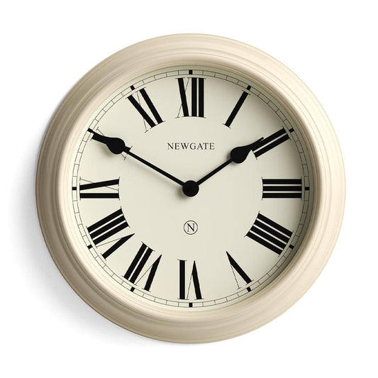Vanilla cream wall clock with Roman numerals and black hands