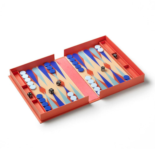 Red backgammon board game set open in a box with blue and white checkers and dice