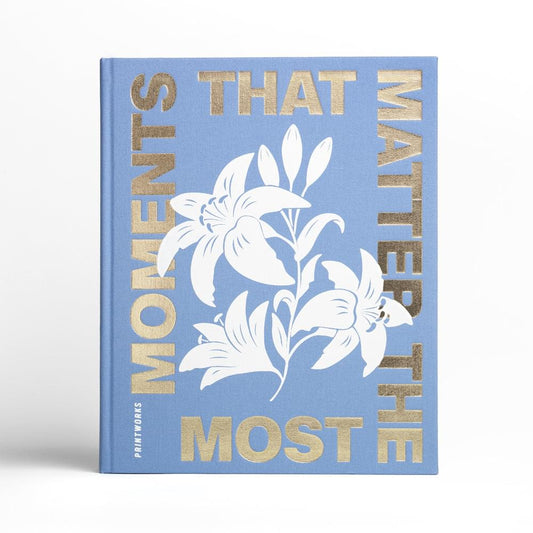 Blue Printworks photo album with white floral bird cover and gold 'MOST' title