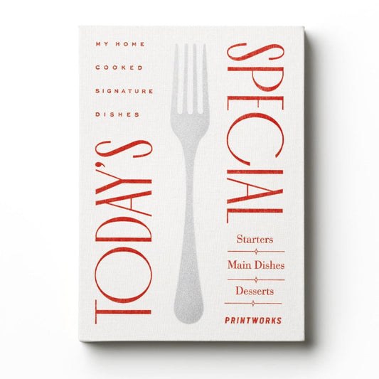 Red-and-white recipe book with fork/knife cover art and category headings