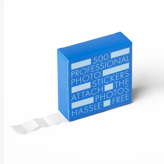 Blue photo sticker pack with loose self-adhesive corner squares