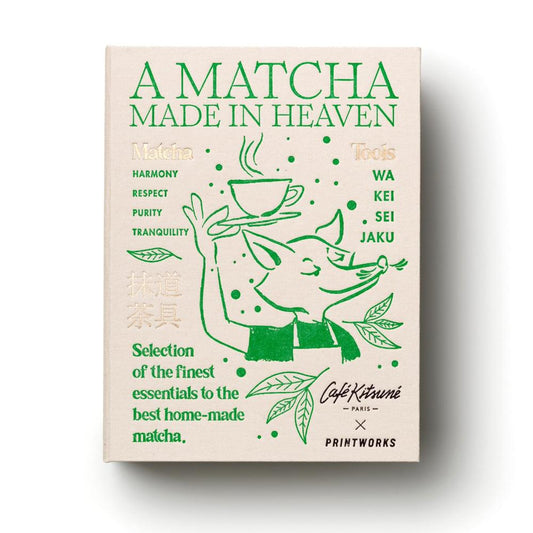 Beige matcha tools box with green illustrated “A MATCHA MADE IN HEAVEN” design