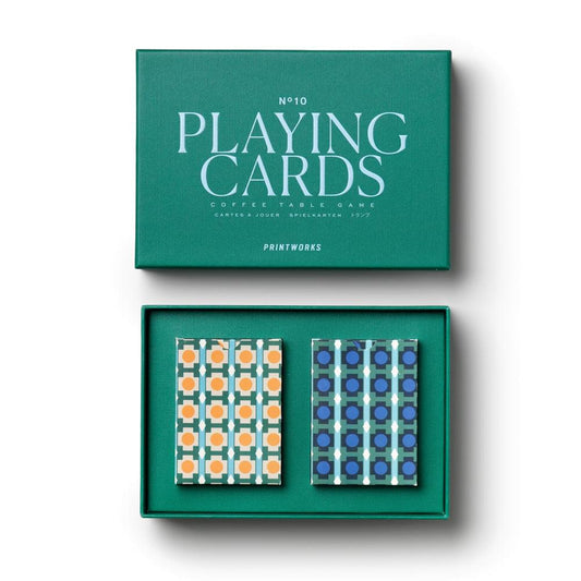 Teal playing card box open, showing two patterned decks with orange and blue backs