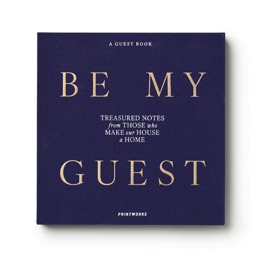 Dark blue guest book with gold 'BE MY GUEST' and 'A guest book' text